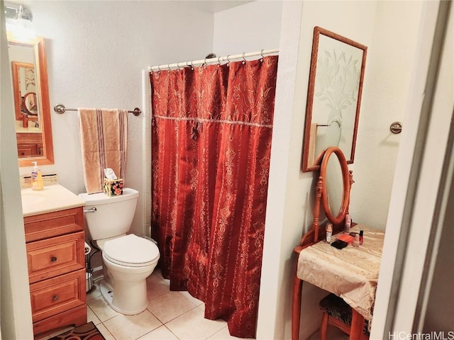 full bathroom featuring a shower with curtain, vanity, toilet, and tile patterned floors