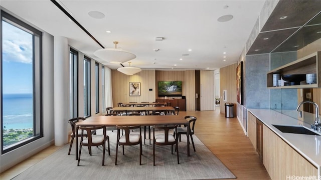 dining room featuring recessed lighting and light wood finished floors