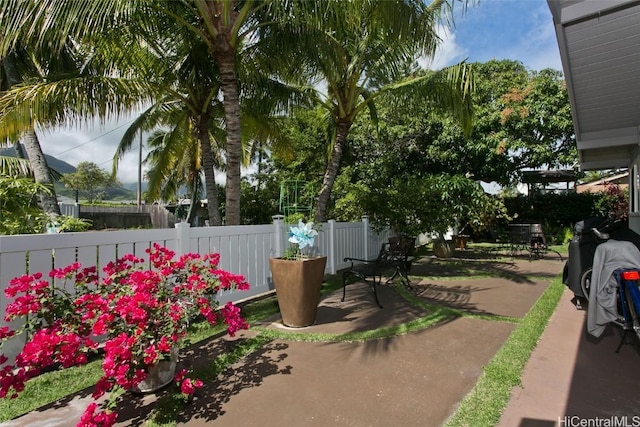 view of patio / terrace with fence