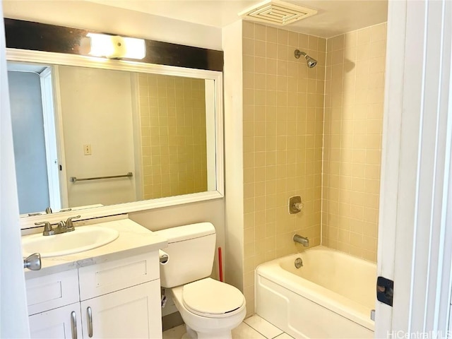 bathroom with toilet,  shower combination, vanity, and visible vents