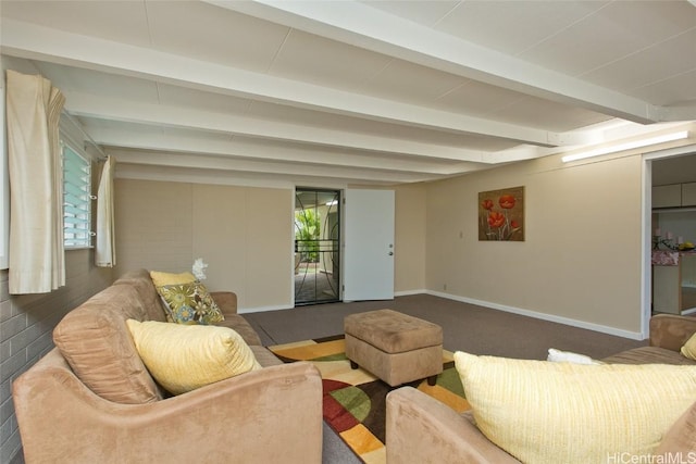 living room featuring beamed ceiling and baseboards