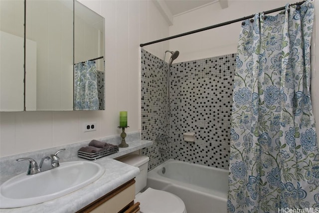 full bathroom featuring vanity, toilet, and shower / tub combo with curtain