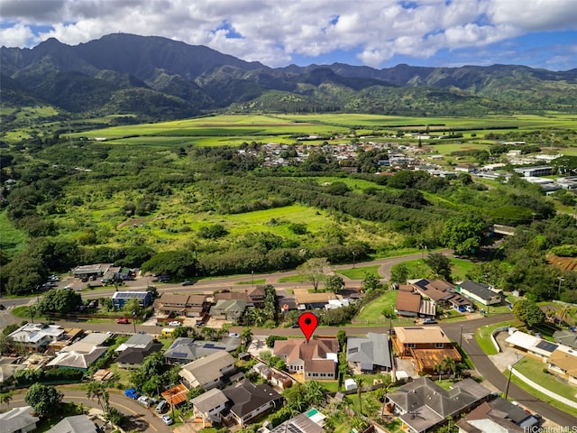 drone / aerial view featuring a residential view and a mountain view