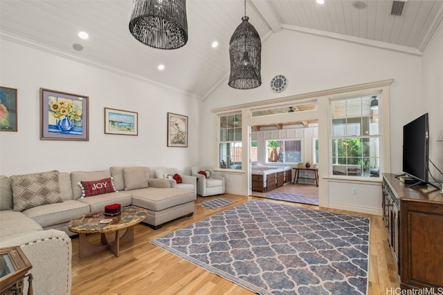 living area featuring wood finished floors, visible vents, beam ceiling, recessed lighting, and crown molding