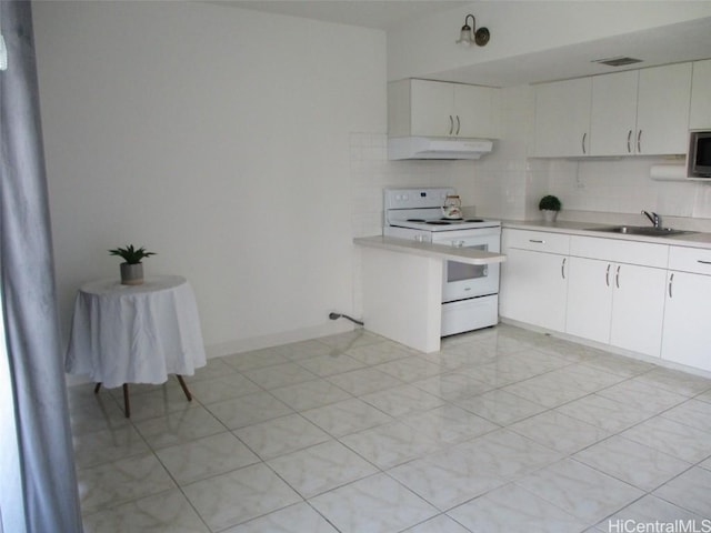 kitchen featuring light countertops, electric range, stainless steel microwave, and under cabinet range hood