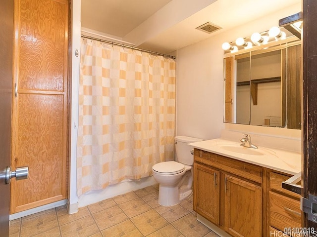 bathroom with curtained shower, toilet, vanity, visible vents, and tile patterned floors