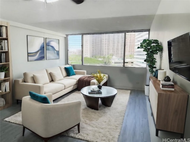 living room with wood finished floors and a wealth of natural light