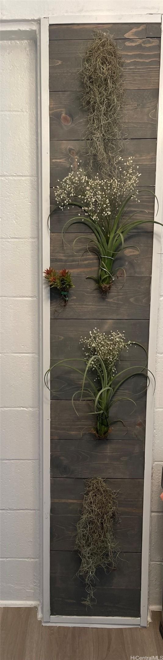 details featuring wood finished floors
