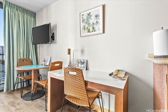 home office featuring wood finished floors