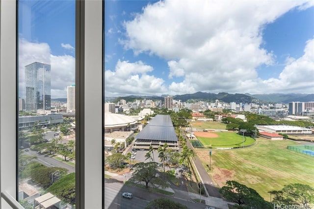 property view of water with a mountain view and a city view