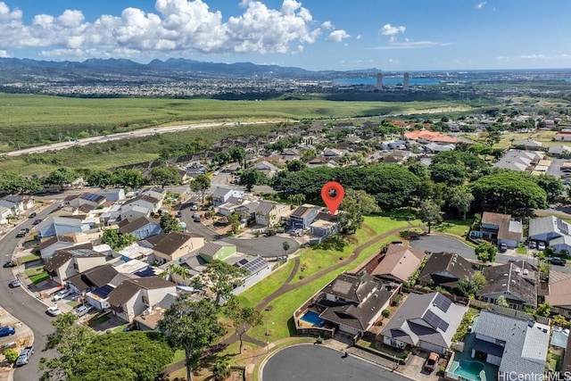 birds eye view of property featuring a mountain view and a residential view