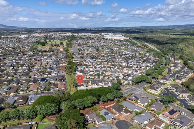 birds eye view of property with a residential view