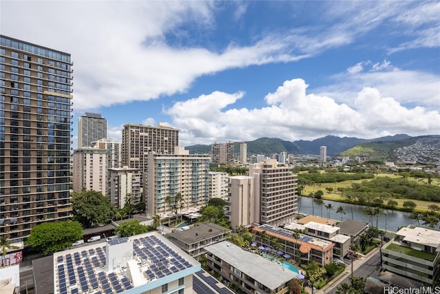 city view with a water and mountain view