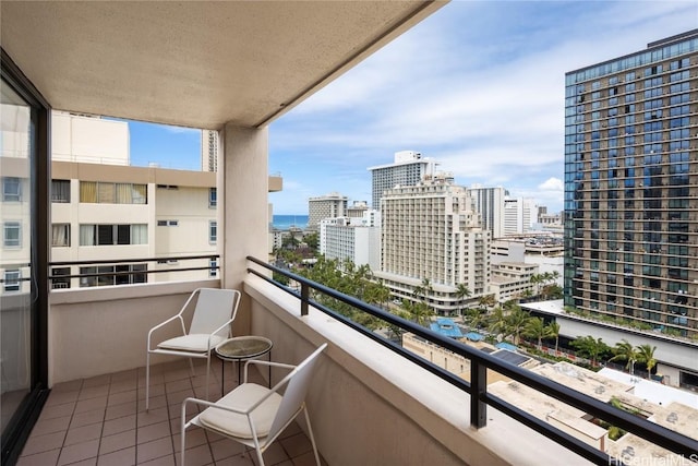 balcony featuring a city view