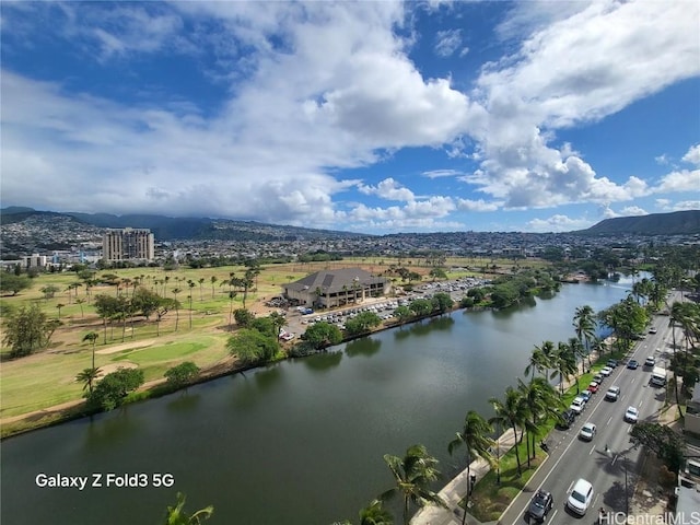 birds eye view of property featuring a water and mountain view