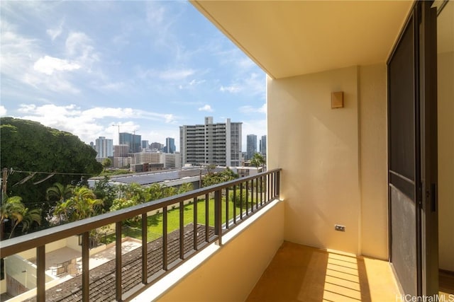 balcony featuring a view of city