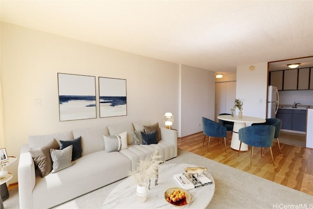 living area with wood finished floors