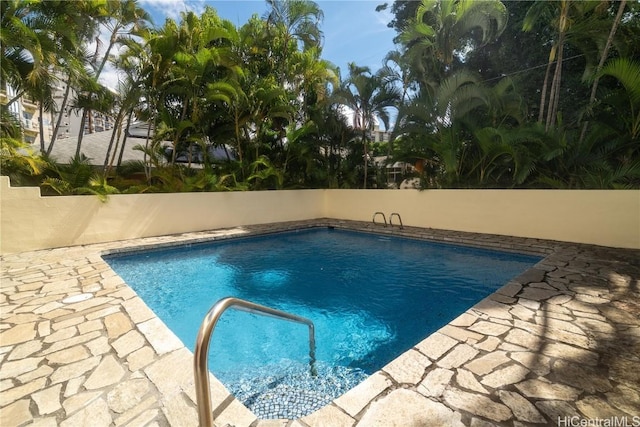 pool with a patio