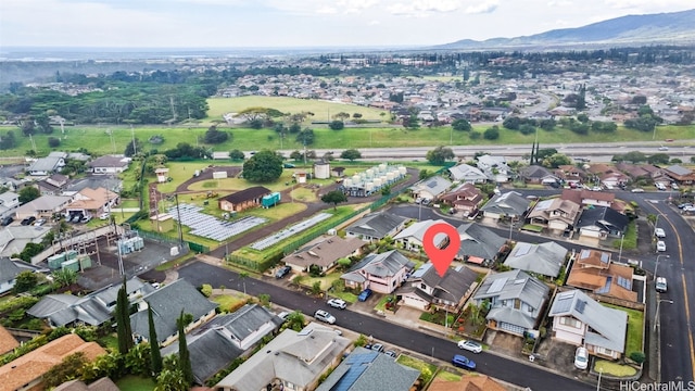 bird's eye view with a residential view and a mountain view