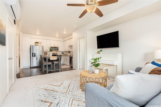 living room with a wall mounted AC, recessed lighting, and ceiling fan