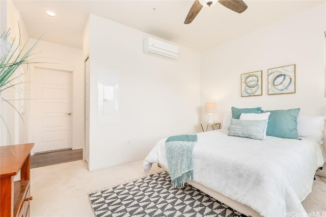 bedroom with recessed lighting, carpet, an AC wall unit, and a ceiling fan