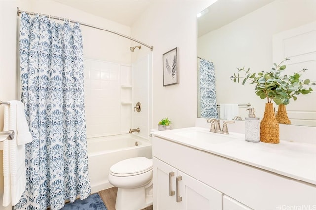 bathroom with toilet, vanity, shower / bath combo, and wood finished floors