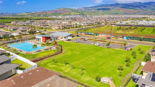 drone / aerial view featuring a mountain view and a residential view