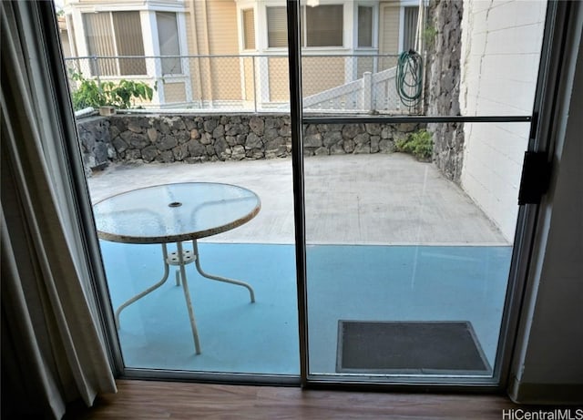 view of patio featuring a balcony