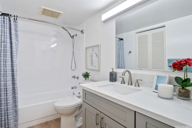 3138 Waialae Ave Unit 217, Honolulu, HI 96816 - bathroom with shower / tub combo with curtain, vanity, toilet, and wood finished floors