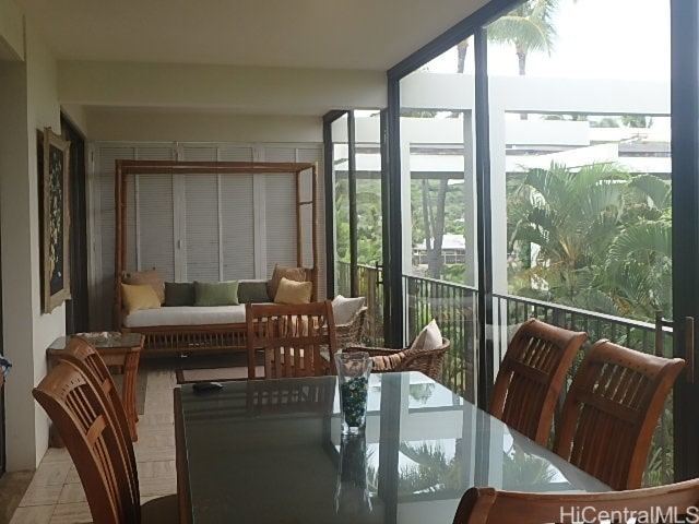 sunroom / solarium with plenty of natural light