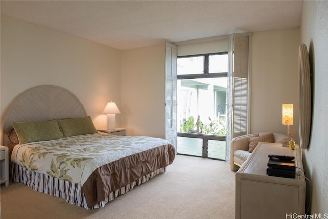 carpeted bedroom featuring multiple windows