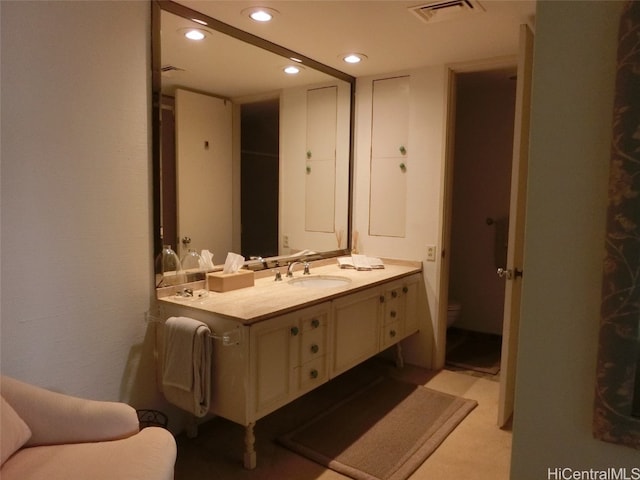 bathroom featuring recessed lighting, visible vents, toilet, and vanity