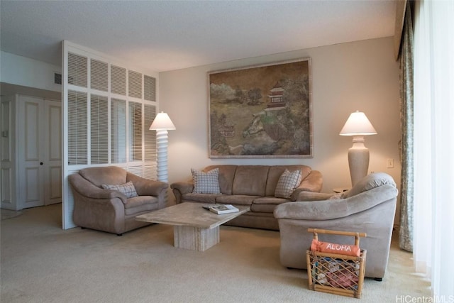 living area with light colored carpet