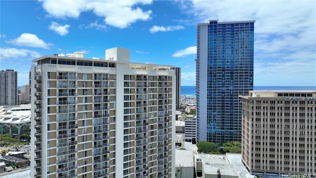 property's view of city with a water view