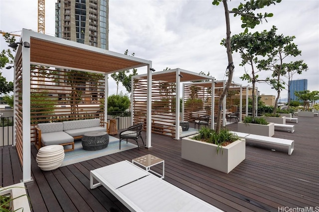 deck with an outdoor hangout area