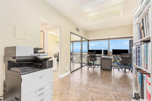 office featuring visible vents and baseboards