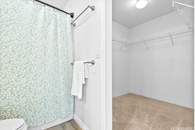 91-6221 Kapolei Pkwy Unit 201, Ewa Beach, HI 96706 - full bath with toilet, a shower with curtain, and a spacious closet