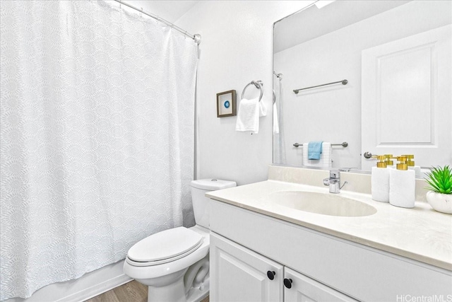91-6221 Kapolei Pkwy Unit 201, Ewa Beach, HI 96706 - full bath featuring vanity, toilet, wood finished floors, and shower / bathtub combination with curtain