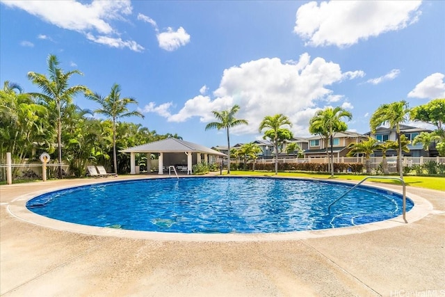 91-6221 Kapolei Pkwy Unit 201, Ewa Beach, HI 96706 - community pool featuring a gazebo, a residential view, and a patio area