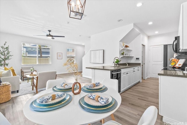 91-6221 Kapolei Pkwy Unit 201, Ewa Beach, HI 96706 - dining area featuring healthy amount of natural light, light wood-style floors, ceiling fan, recessed lighting, and baseboards