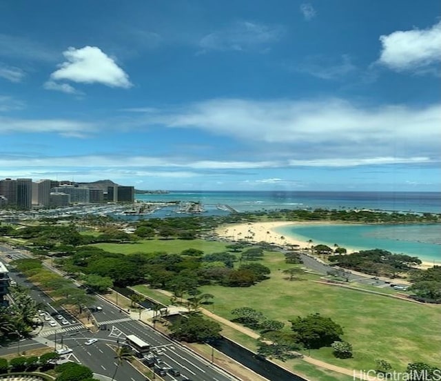 birds eye view of property with a water view