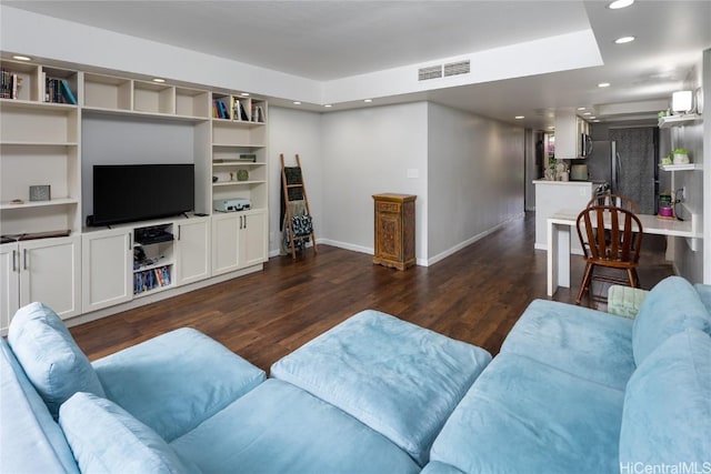 living area with visible vents, recessed lighting, baseboards, and dark wood-style flooring