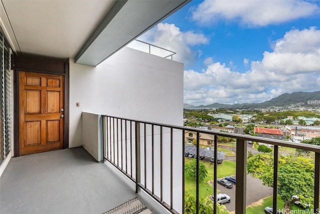 balcony featuring a mountain view