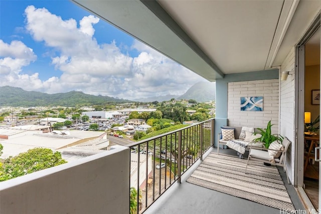 balcony featuring a mountain view