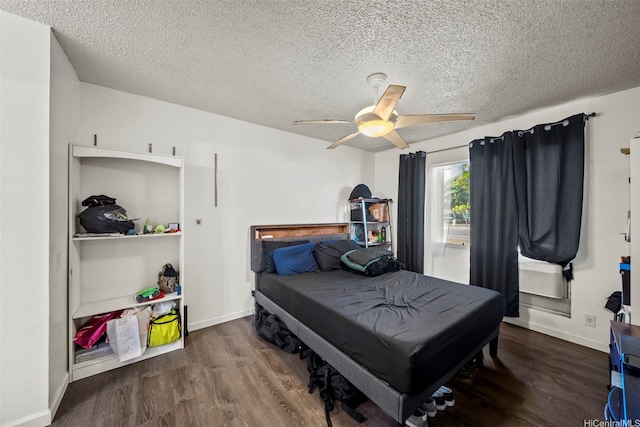 91-1018 Mikohu St Unit 20A, Ewa Beach, HI 96706 - bedroom featuring a textured ceiling, baseboards, a ceiling fan, and wood finished floors