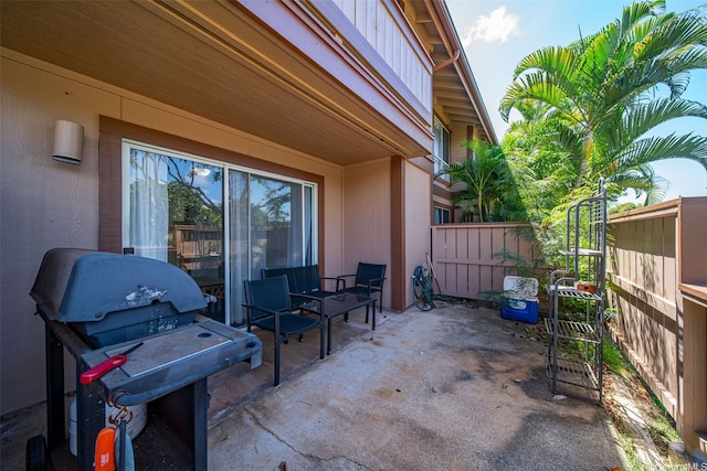 91-1018 Mikohu St Unit 20A, Ewa Beach, HI 96706 - view of patio with area for grilling and fence