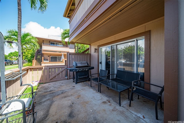 91-1018 Mikohu St Unit 20A, Ewa Beach, HI 96706 - view of patio with area for grilling, fence, and a gate