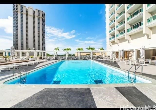 410 Atkinson Dr Unit 2209, Honolulu, HI 96814 - community pool with a patio area