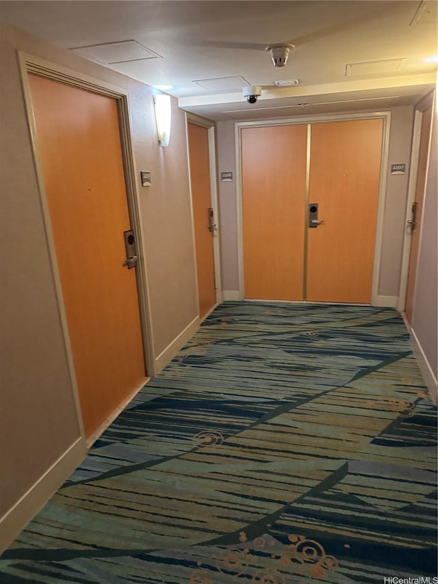 410 Atkinson Dr Unit 2209, Honolulu, HI 96814 - hallway featuring carpet floors and baseboards