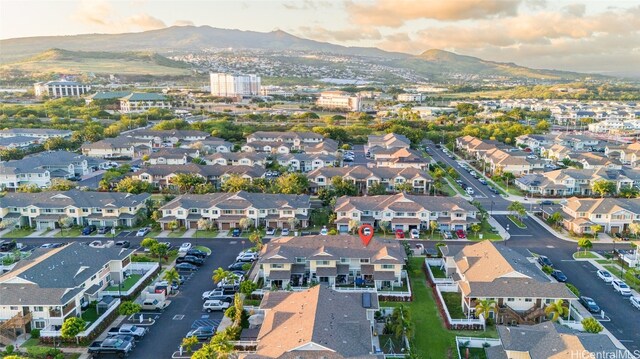 aerial view featuring a mountain view and a residential view